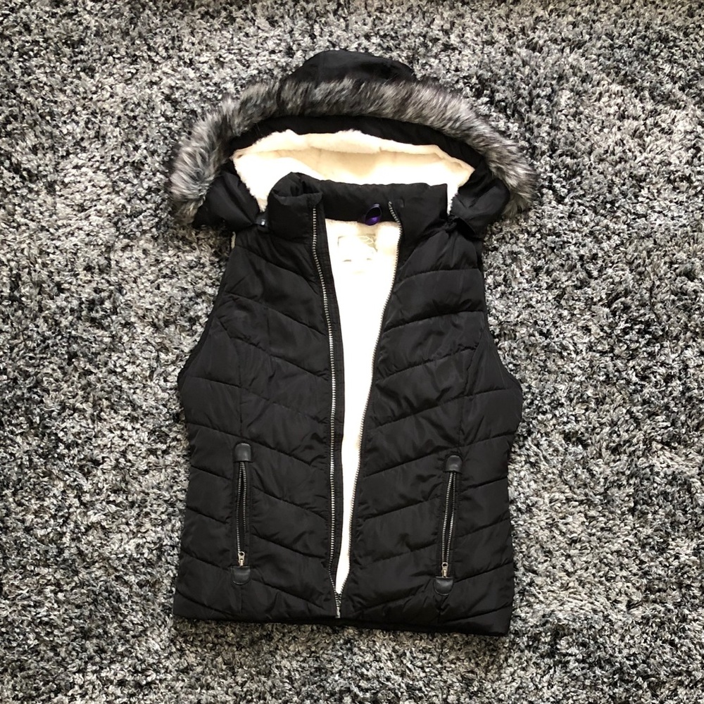 Black and white fuzzy lined puffer vest